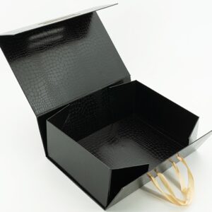 Folding box with handle